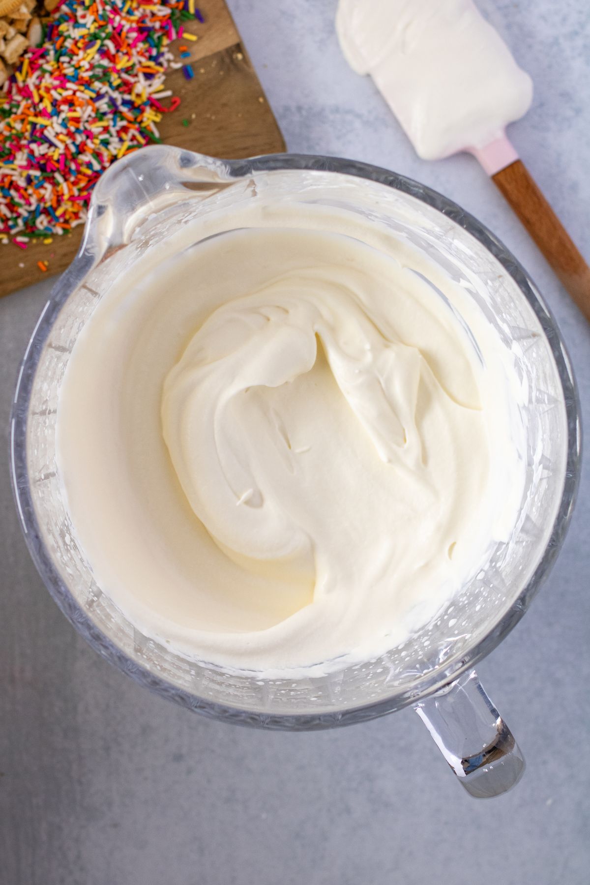 Golden Oreo vanilla ice cream base in mixing bowl.