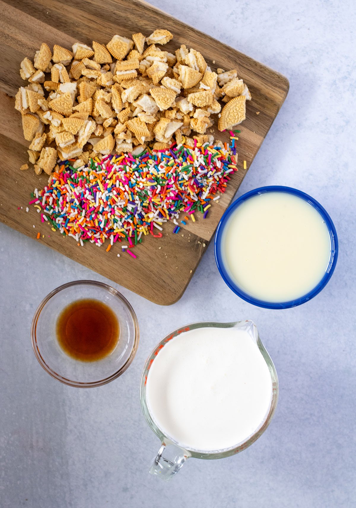 Ingredients to make Golden Oreo Ice Cream set out on the counter.