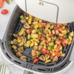 Air Fryer Vegetables in the air fryer basket.
