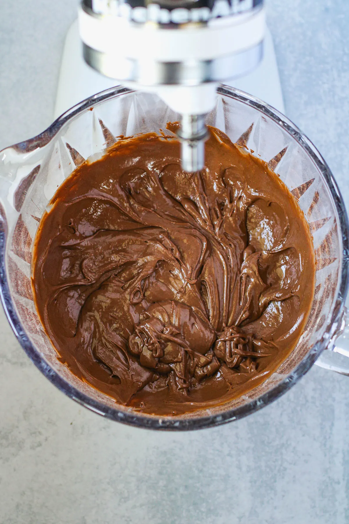 Donut batter in the stand mixer bowl.