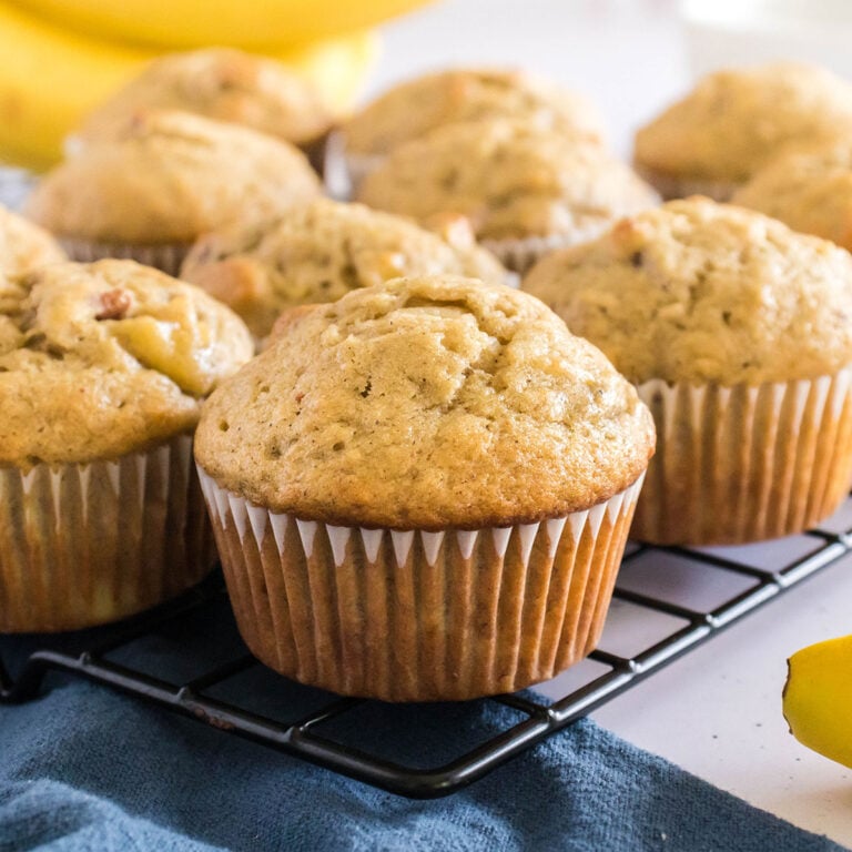 Banana Bread Muffins on a wire cooling rack.