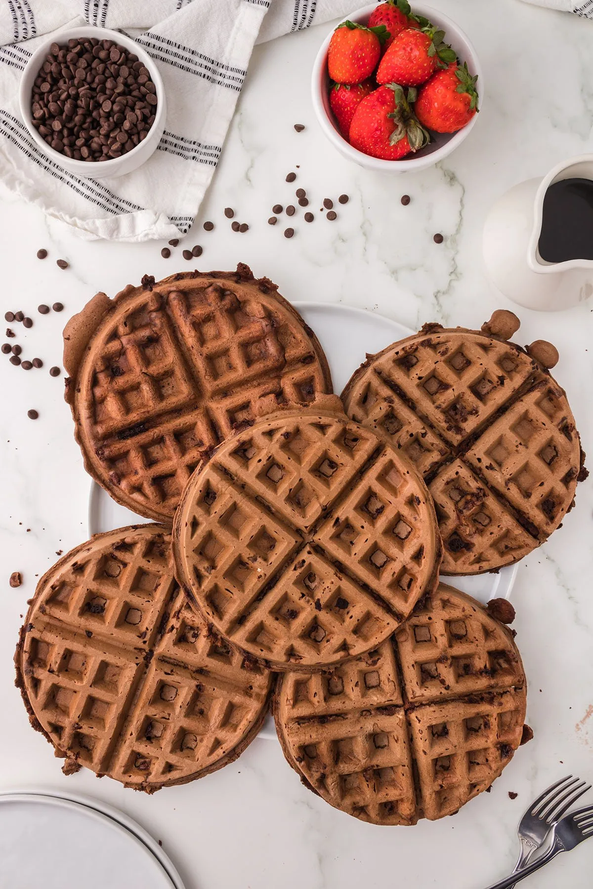 Chocolate Waffles on a white serving platter.