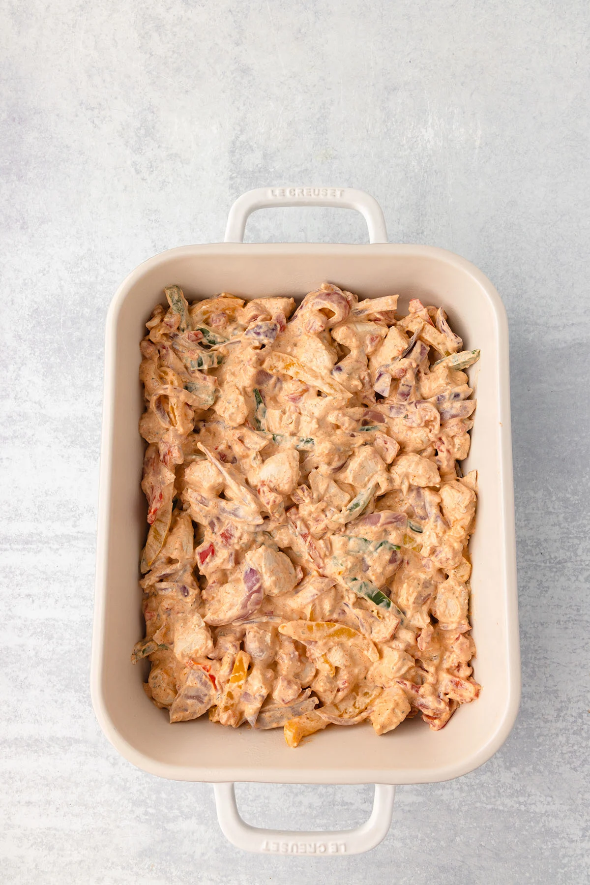 Chicken Fajita Casserole filling in the baking dish.