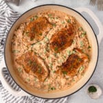 Pork Chops and Rice cooked in a skillet.