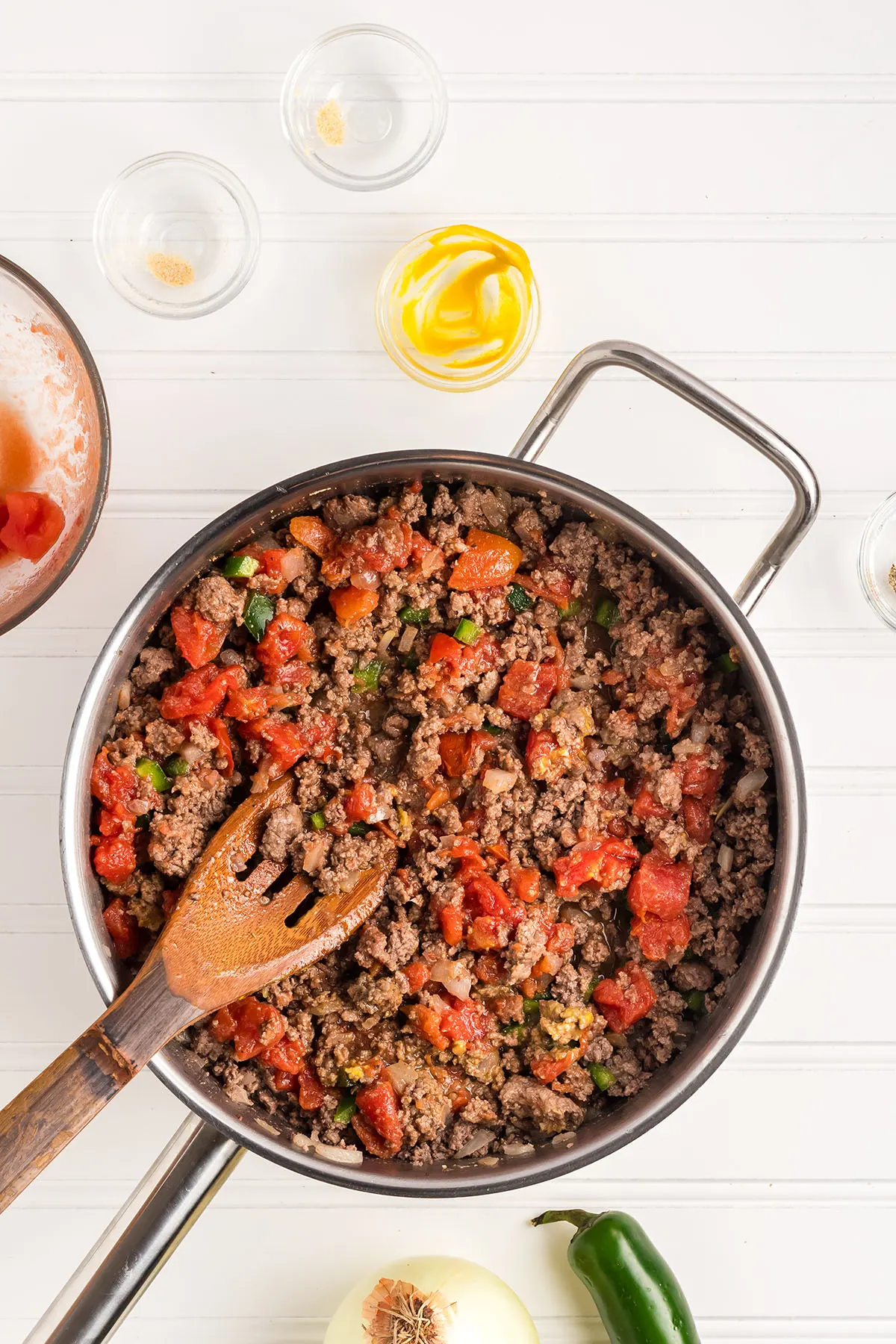 Cooked Big Mac ground beef mixture for casserole in a skillet.