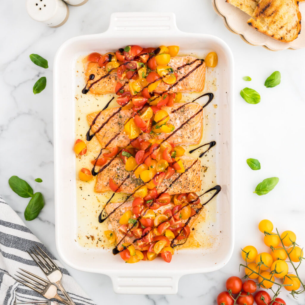 Baked Salmon with Bruschetta topping, drizzled with balsamic glaze.