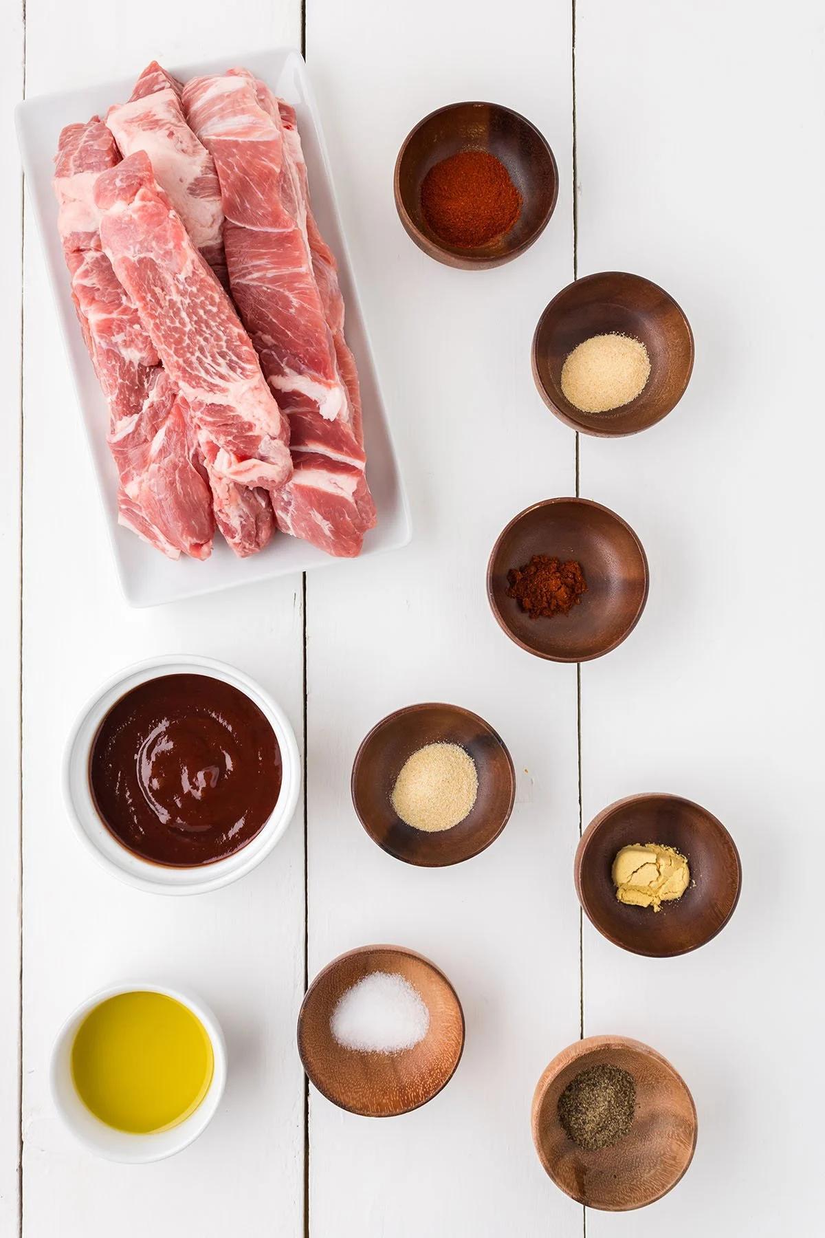 Ingredients to make BBQ Boneless Pork Ribs set out on the counter.