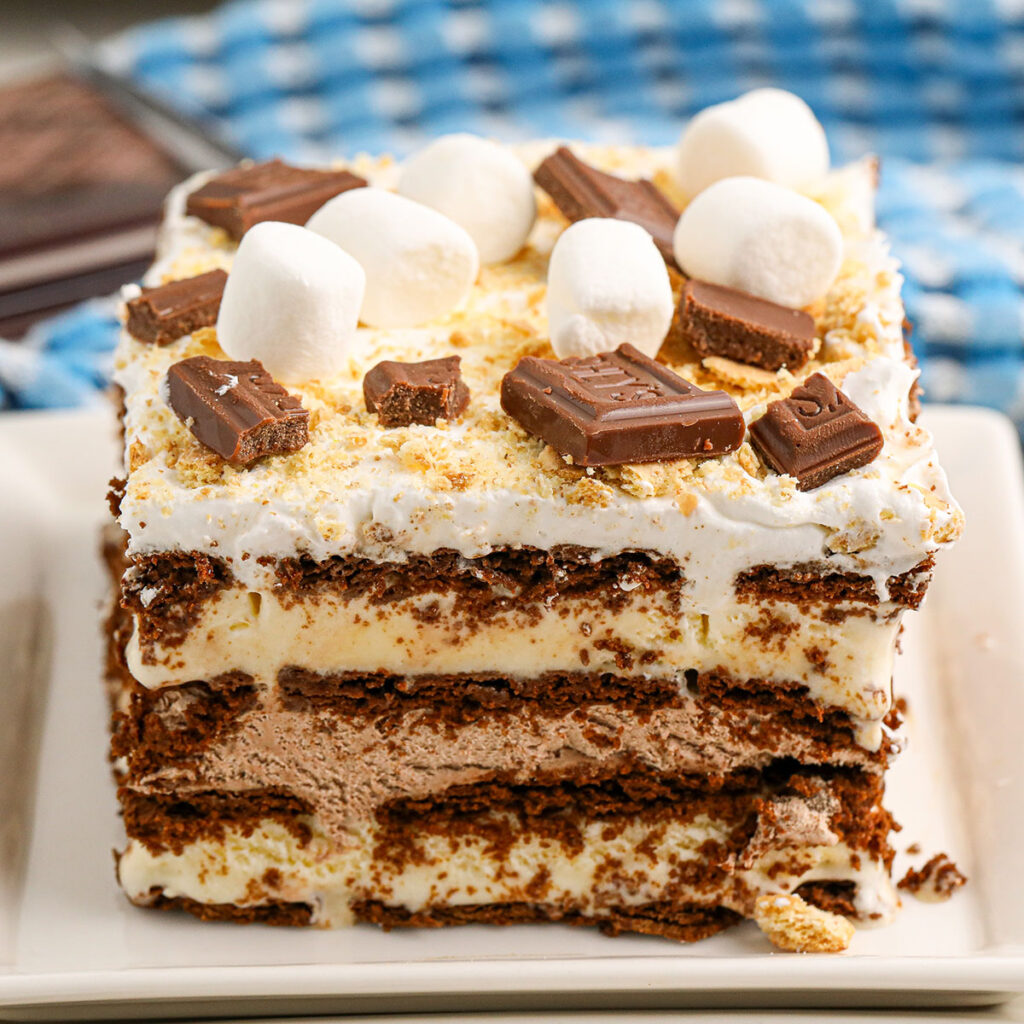 A slice of Smores Ice Cream Sandwich Cake on a plate.