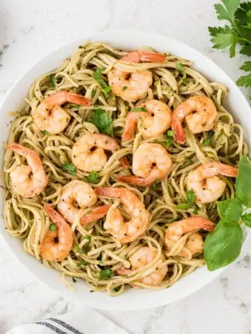Shrimp Pesto Pasta in a white bowl.