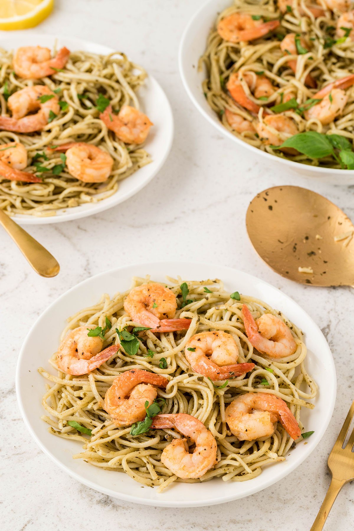 Shrimp Pesto Pasta served in a white bowl.