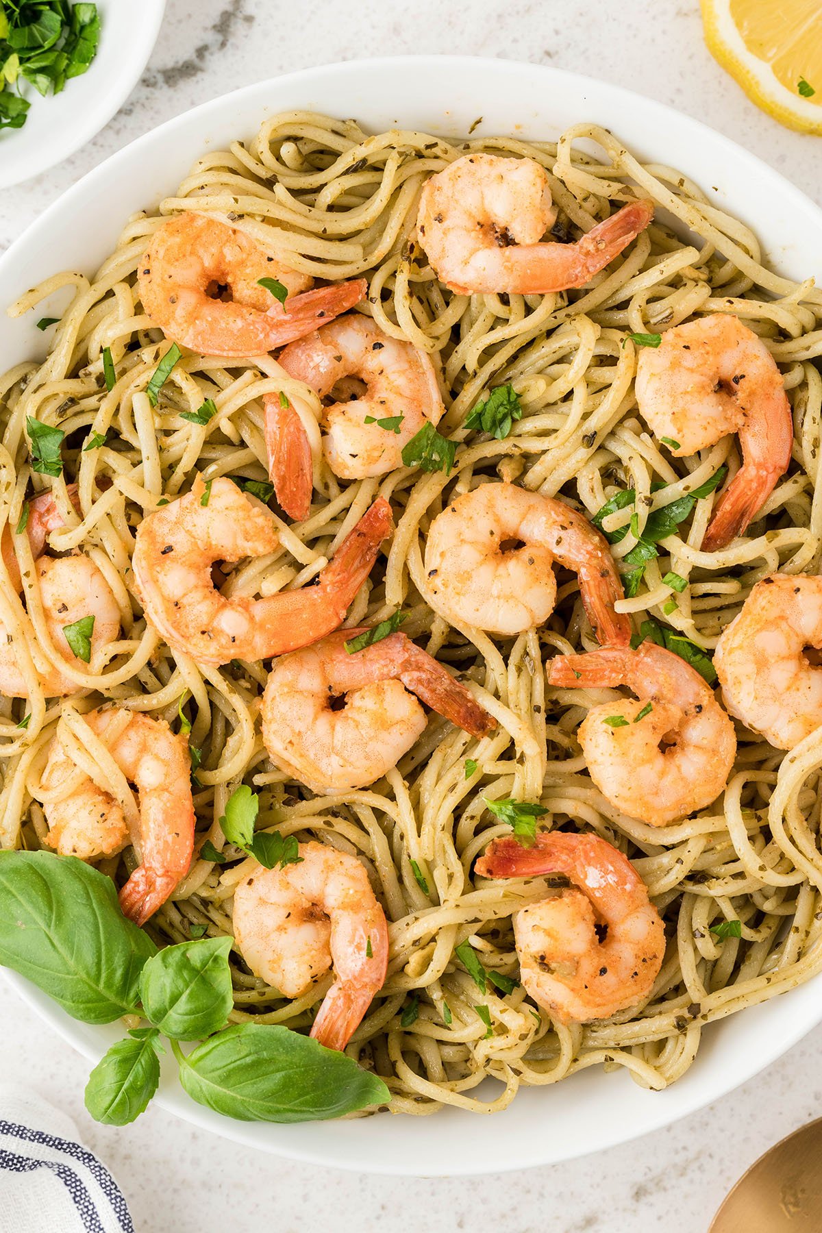 Shrimp Pesto Pasta served in a white bowl.
