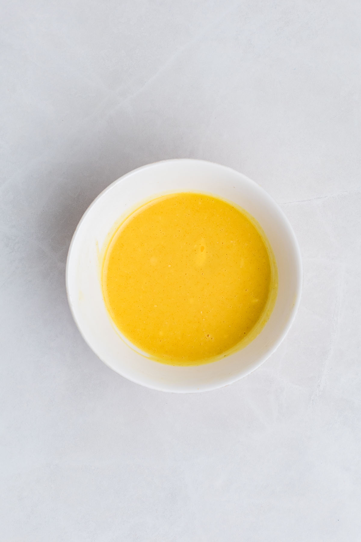 Honey mustard sauce in a bowl.