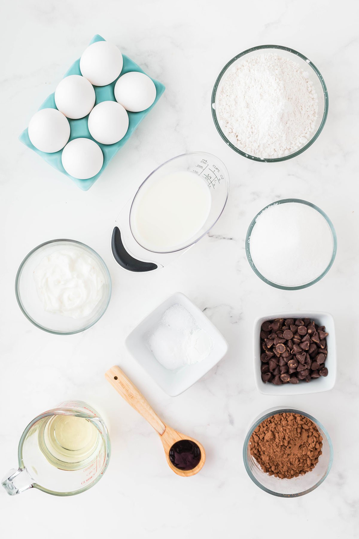 The ingredients for the Chocolate Loaf Cake are set out on the counter.
