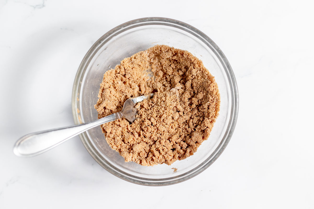 Streusel topping in a glass mixing bowl.