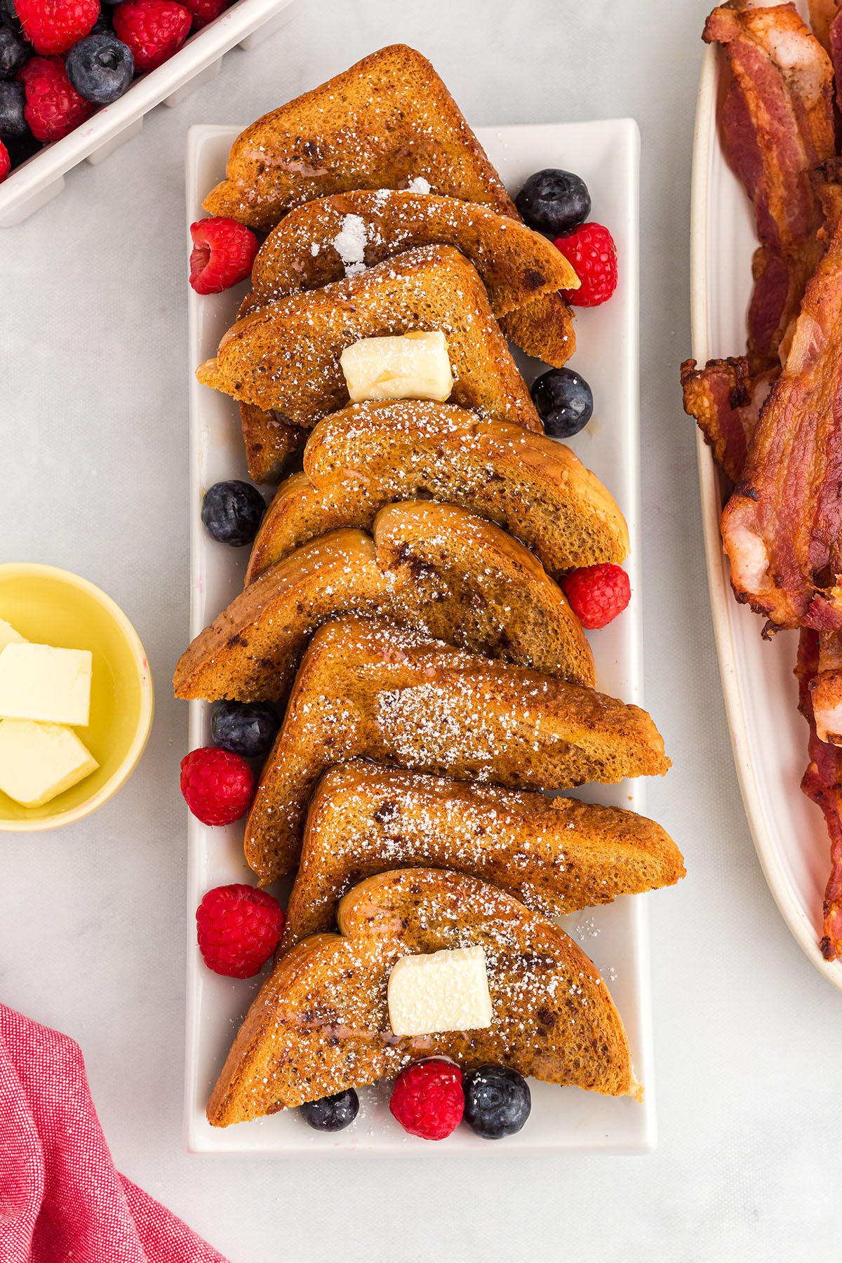 Gingerbread French toast slices on a white serving platter.