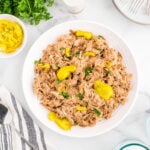Mississippi chicken in a white serving bowl.
