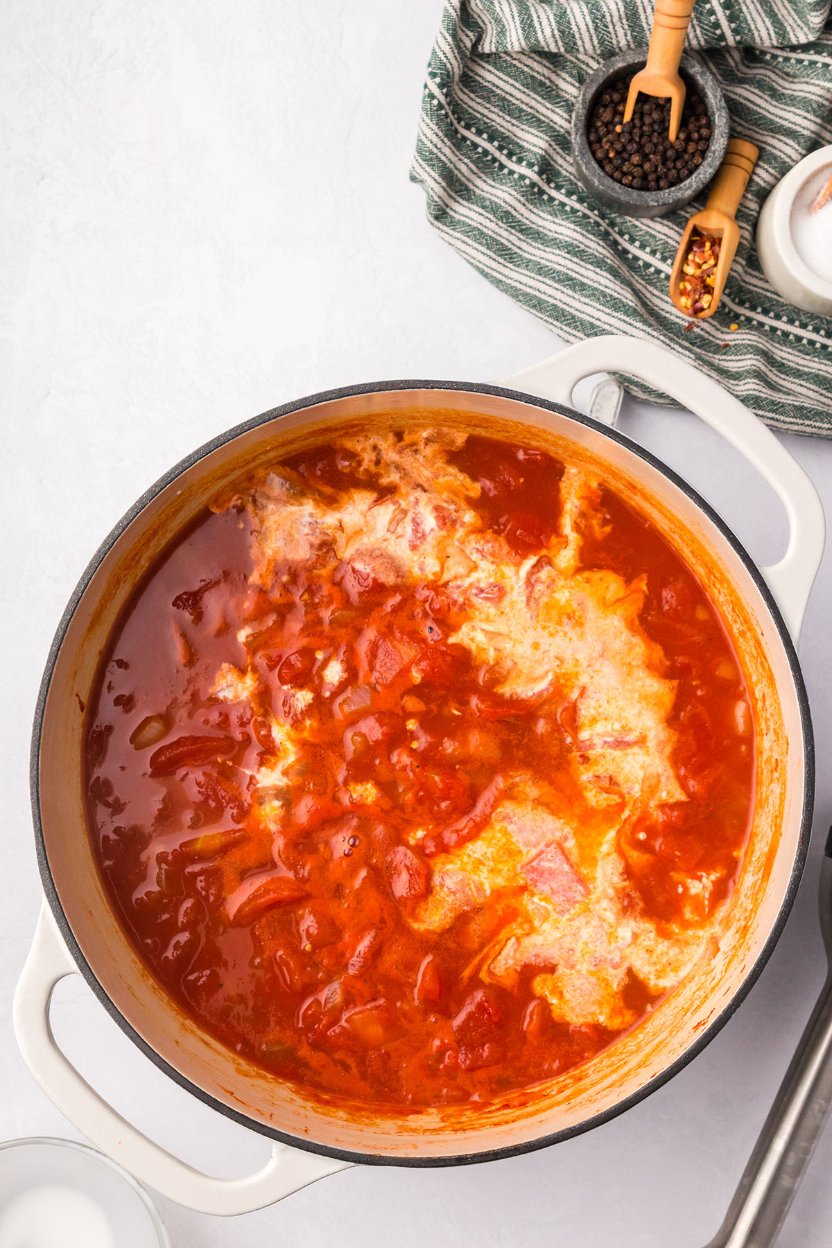 Half and half added to the tomato mixture in the large pot.