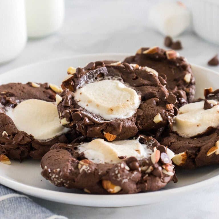 Chocolate Rocky Road Cookies on a white plate.
