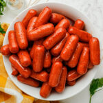 Honey BBQ Little Smokies served in a white bowl.