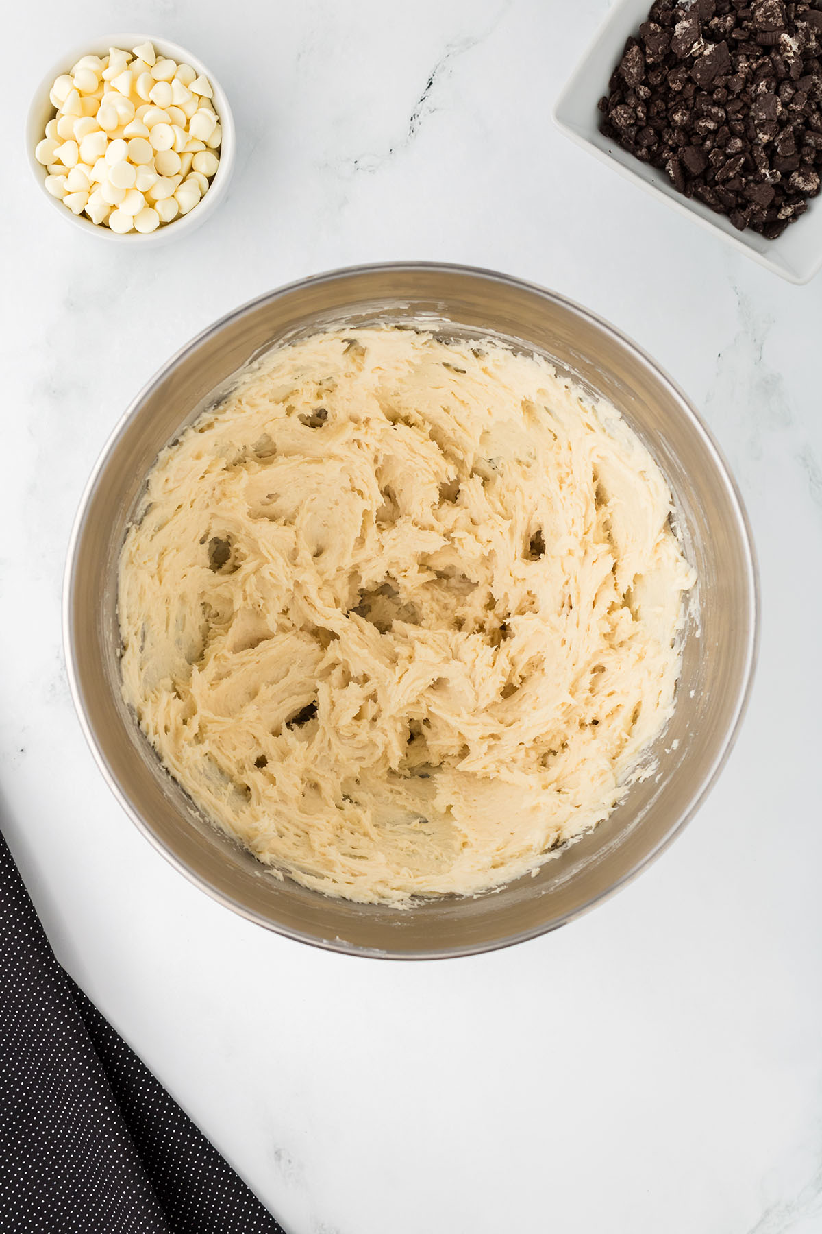 Butter, sugar, cream cheese, sour cream, flour, salt, and vanilla in a mixing bowl.