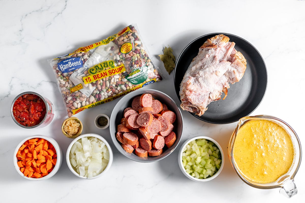 The ingredients to make 15-bean sausage soup are set out on the counter.