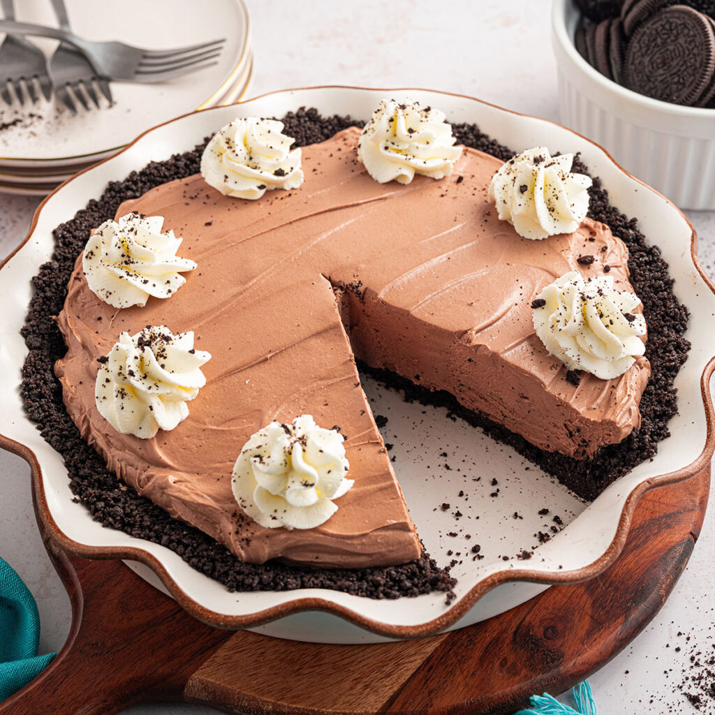 Chocolate Cheesecake in a pie dish with a slice cut out.