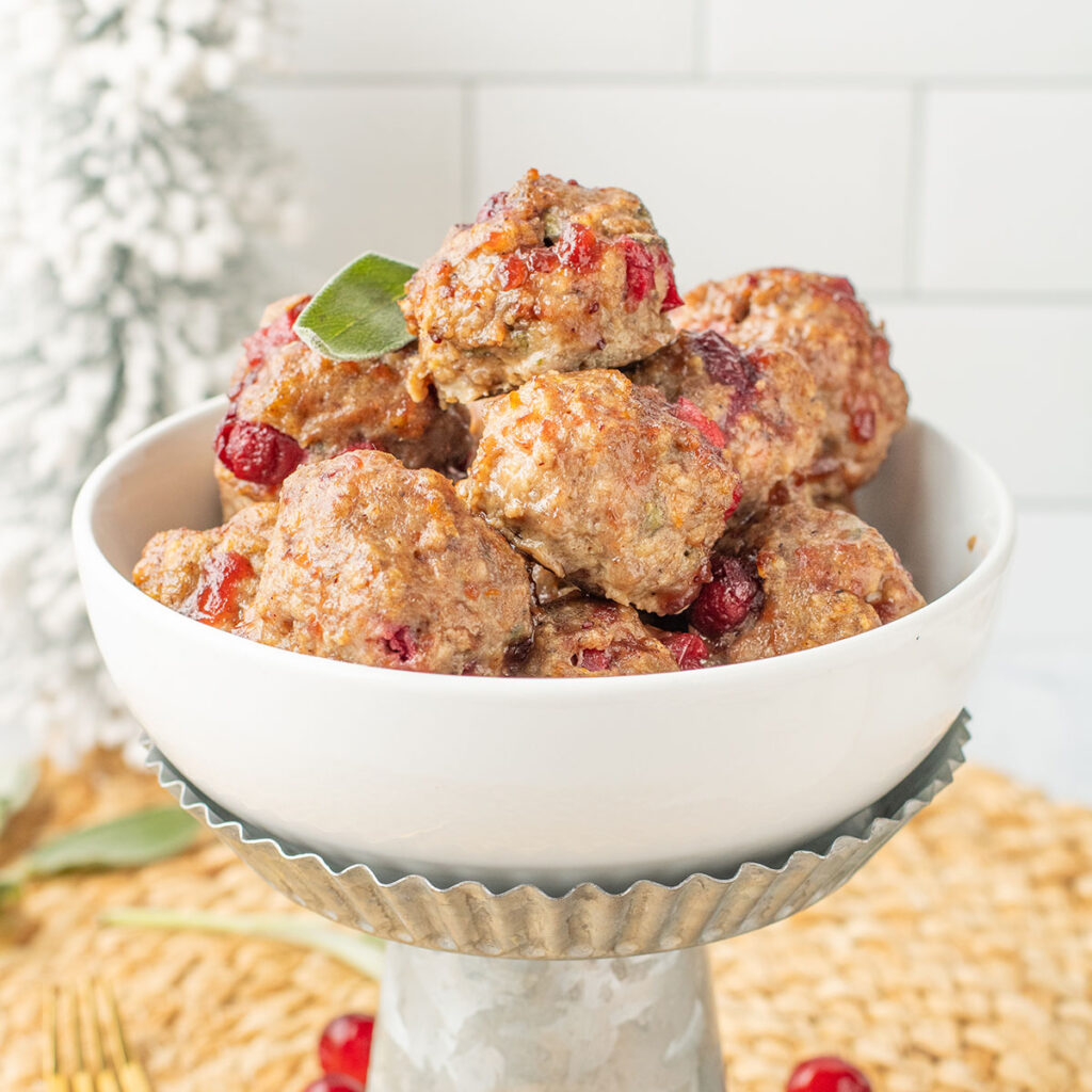 Cranberry Turkey Meatballs in a white bowl.